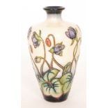 A Moorcroft Pottery vase decorated in the Hepatica pattern designed by Emma Bossons,