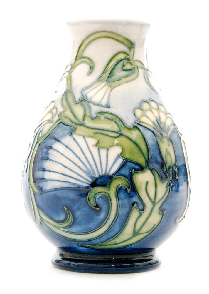 A small Moorcroft Pottery baluster vase decorated in the Hawksbeard pattern designed by Rachel