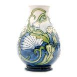A small Moorcroft Pottery baluster vase decorated in the Hawksbeard pattern designed by Rachel