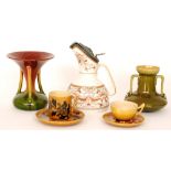 Five pieces of assorted early 20th Century Arts and Crafts style pottery comprising a Bretby vase