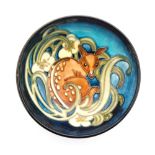 A Moorcroft Pottery small footed bowl decorated in the Fallow Deer pattern designed by Kerry