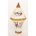 A 19th Century enamelled decorated bonbonniere detailed with floral sprays to flaring body and