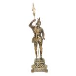 A 20th Century brass model of a Spanish soldier holding a halberd, height 79cm.