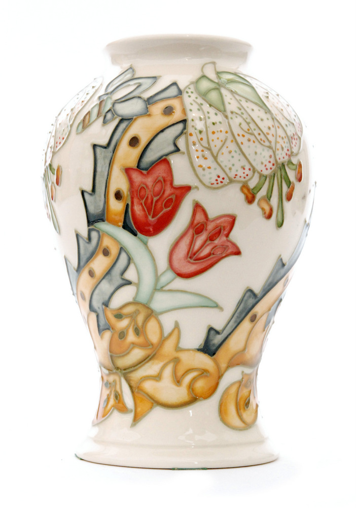 A Moorcroft Pottery vase of inverted baluster form decorated in the Golden Lily (Ivory) pattern