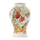 A Moorcroft Pottery vase of inverted baluster form decorated in the Golden Lily (Ivory) pattern