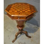 A Victorian walnut octagonal work table,