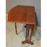 An Edwardian satinwood crossbanded mahogany Sutherland table,