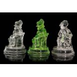 A pair of late 19th Century John Derbyshire pressed glass Punch and Judy figures,