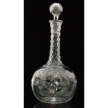 A late 19th Century crystal glass decanter of globe and shaft form with hollow blown ball stopper,