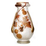 A large early 20th Century Mont Joye and Cie glass vase of footed tapering form with a swollen neck,