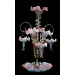 A large late 19th Century epergne with a deep frill rim bowl rising to a central posy trumpet with