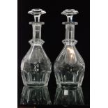 A pair of mid 20th Century Baccarat Harcourt crystal glass decanters of drawn globe and shaft form,