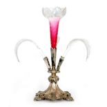 A late 19th Century Goldsmiths and Silversmiths table centre epergne of fluted form with relief