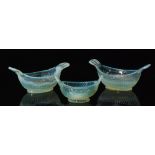 A pair of late 19th Century Sowerby Blanc de Lait pressed glass salts of elliptical form between