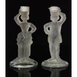 A pair of late 19th Century Baccarat pressed glass candlestick,