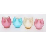 A group of four late 19th Century John Walsh Walsh satin air trap glass posy vases,