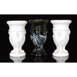 A pair of late 19th Century Edward Moore pressed glass Chained Swan vases,