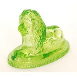 A late 19th Century John Derbyshire uranium green pressed glass paperweight in the form of a