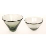 A post war Holmegaard glass bowl designed by Per Lutken of asymmetric form, dated 1961, height 17cm,