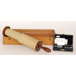 A Fullers spiral slide rule in mahogany fitted case,