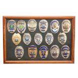 A collection of late 20th Century American enamelled police officers badges for Iowa,