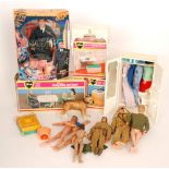 A collection of 1960 and 1970s Action Man figures with various clothes and accessories,