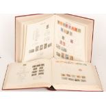 Two Imperial albums of stamps including a penny black and Victorian GB definitives,