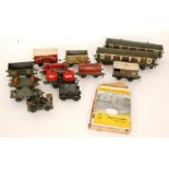 Two Pullman O gauge locomotives in green livery with two spare motors,