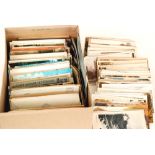 A collection of Edwardian and later postcards to include real photographic cards,