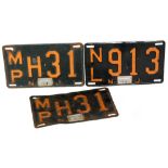A pair of American licence plates each with tag 56 No 1004070 for NJ and MPH31 and a similar plate