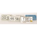 American licence plates dated N Dakota 62, Washington DC 67, Kansas 67,