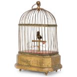 A singing bird-in-a-cage, probably by Griesbaum, the rotating bird with movement to beak,