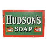 An early 20th Century pictorial enamel advertising sign for Hudson's Soap with white text with