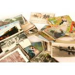 A collection of loose Edwardian postcards to include military,