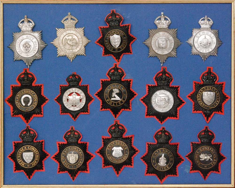 A collection of 20th Century police helmet badges to include Suffolk and Norfolk constabulary,