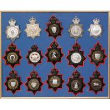 A collection of 20th Century police helmet badges to include Suffolk and Norfolk constabulary,