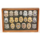 A collection of late 20th Century American enamelled police officer's badges including various