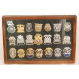 A collection of late 20th Century American enamelled police officer's badges,