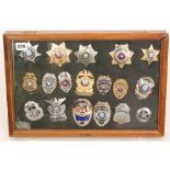 A collection of late 20th Century American enamelled police officer's department badges for Texas,