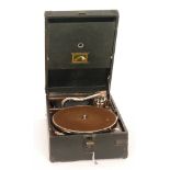 An HMV portable gramophone, model C101G,