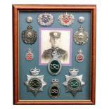 A group of police helmet and lapel badges reputed for Sergeant Edwin Baker of the Staffordshire
