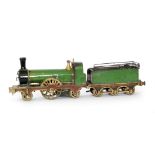 A 19th Century spirit fired standard gauge 2-2-2 locomotive and tender finished in green livery,