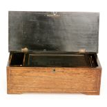 A musical box playing six airs, serial no 48891, cylinder 20cm, inlaid case width 40cm.