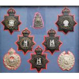 A collection of 20th Century West Midlands police helmet badges to include Birmingham,