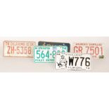 A collection of American licence number plates to include Oklahoma 78, New York ABH 31,