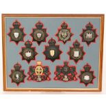 A collection of 20th Century police helmet badges to include Wakefield, Portsmouth, City of London,
