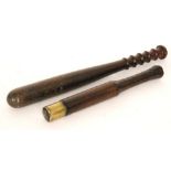 A George III rosewood truncheon the tip mounted with a weighted brass collar inscribed GR Thomas