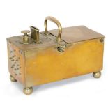 A mid 19th Century brass tobacco honesty box of rectangular form with coin slot operation,