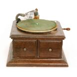 An HMV re-entrant oak cased gramophone with exhibition reproducer,