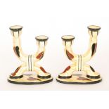 A pair of 1930s Ditmar Urbach Art Deco twin sconce candlesticks each glazed in yellow with brown